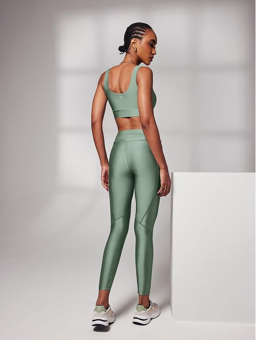 CALZA LEGGING CON RECORTES Y BOLSILLO